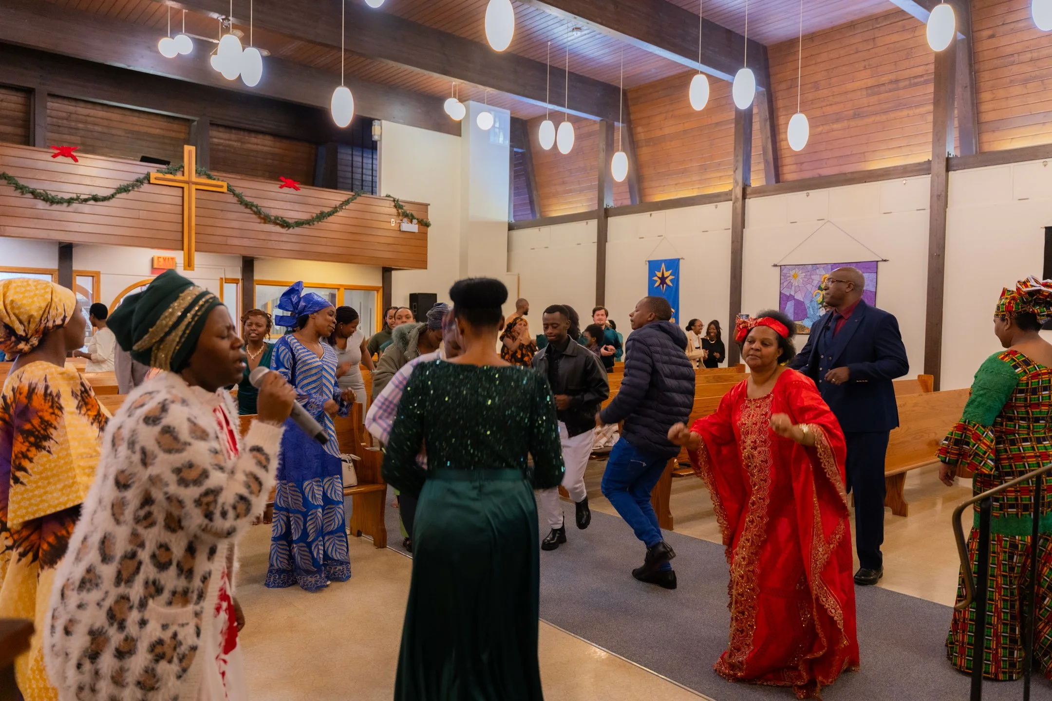 Members of the Carmel congregation dancing together