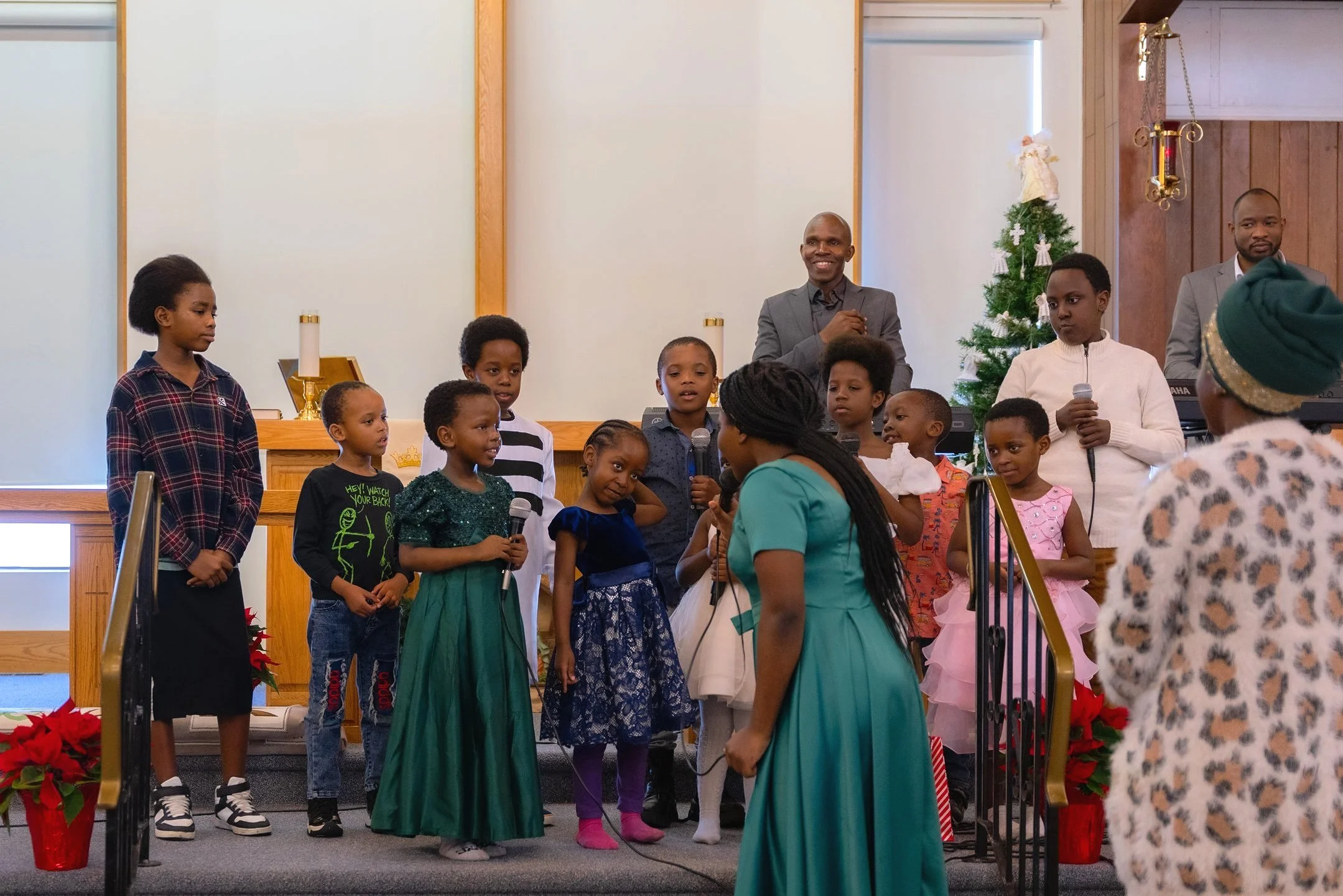 A group of children singing at Carmel