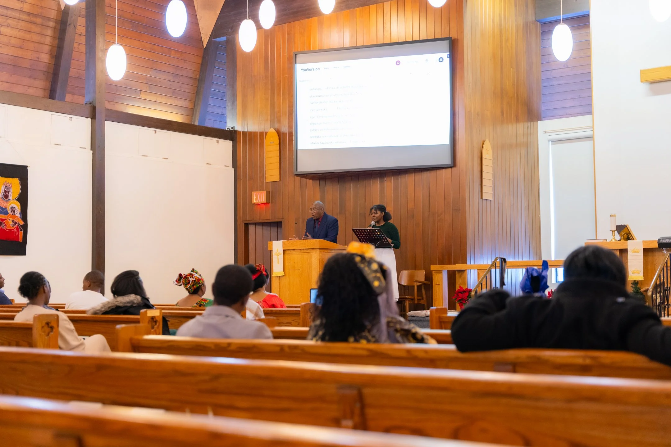 A service inside the Carmel sanctuary with the congregation and speakers